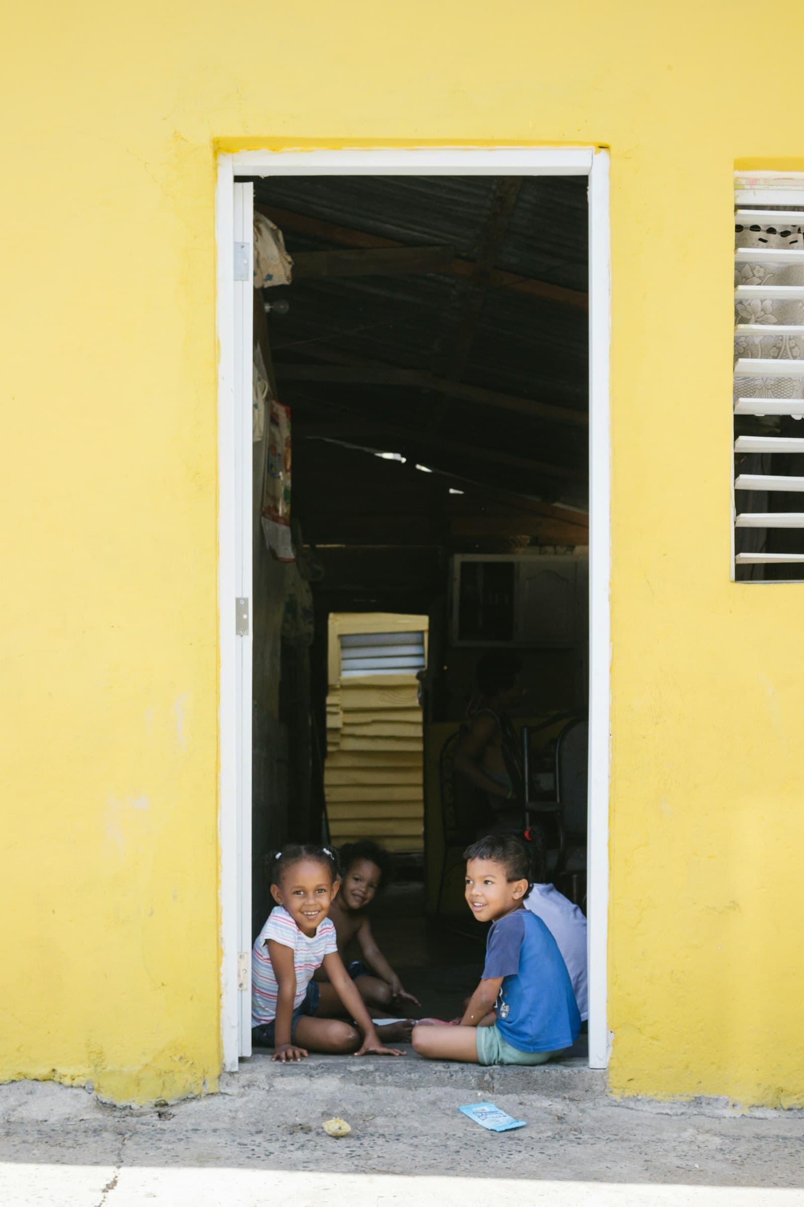 Happy children sitting together and smiling