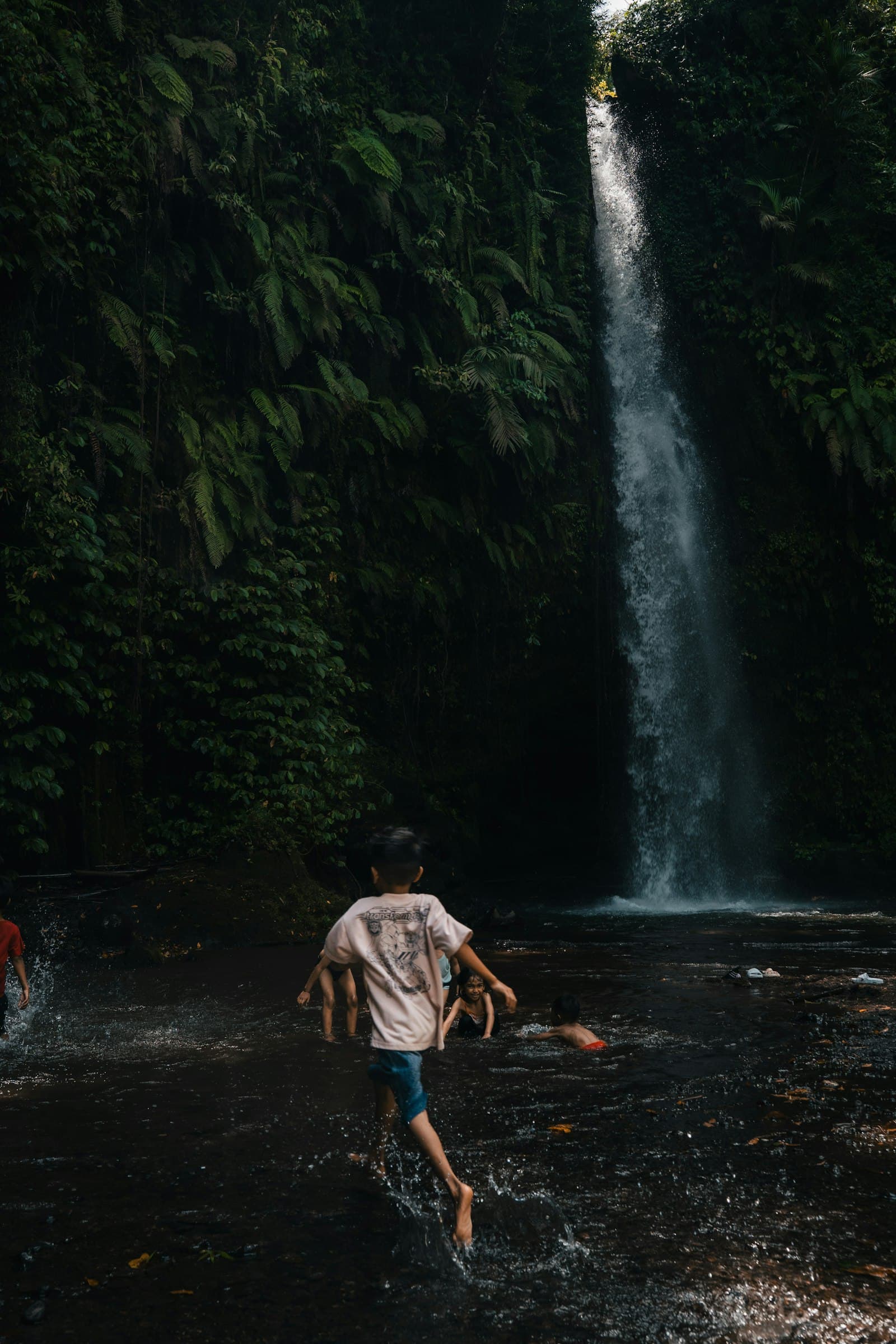 Children happily playing together in the water